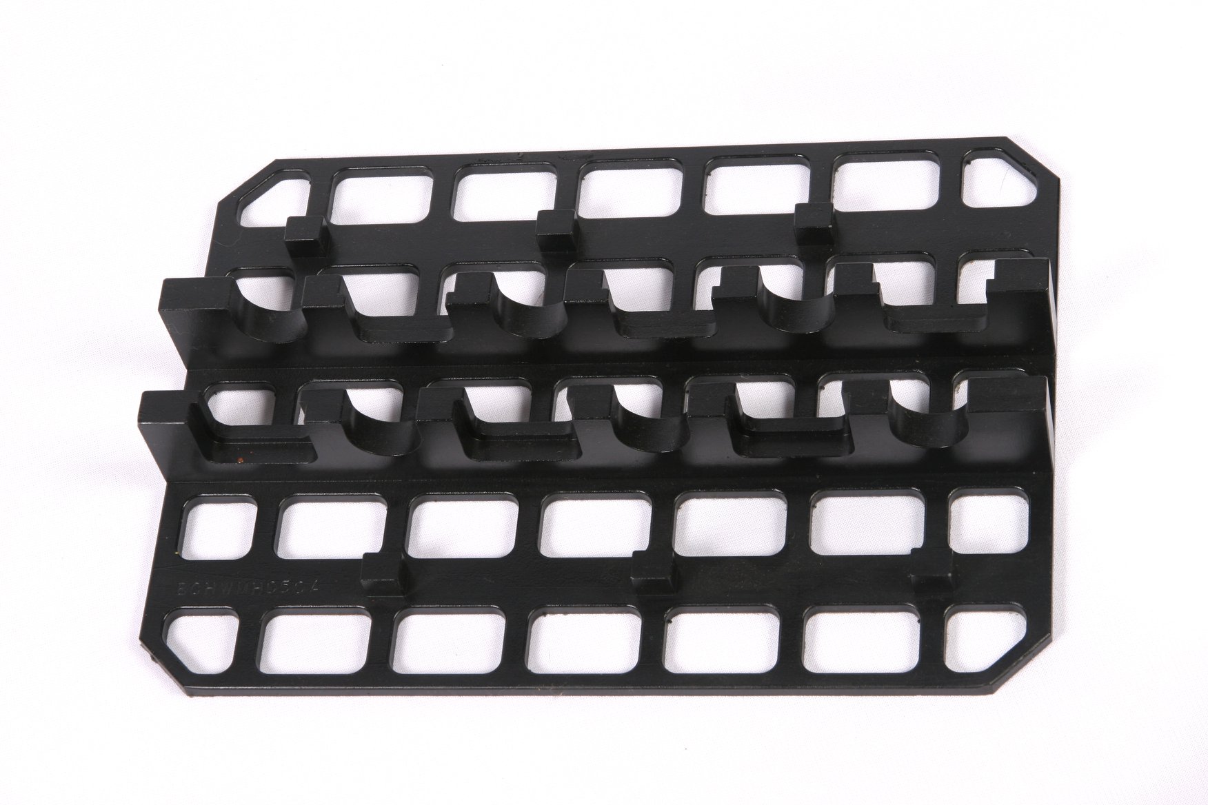 Lightweight, black urethane dunnage tray. 