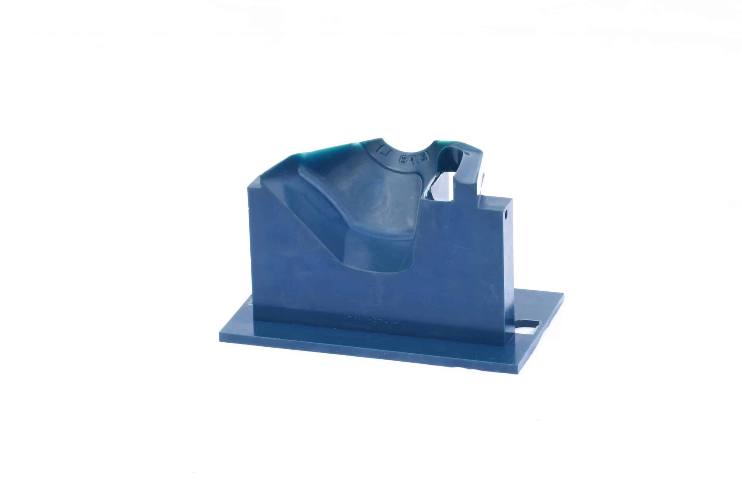 Blue polyurethane body block made from cold cast urethane.