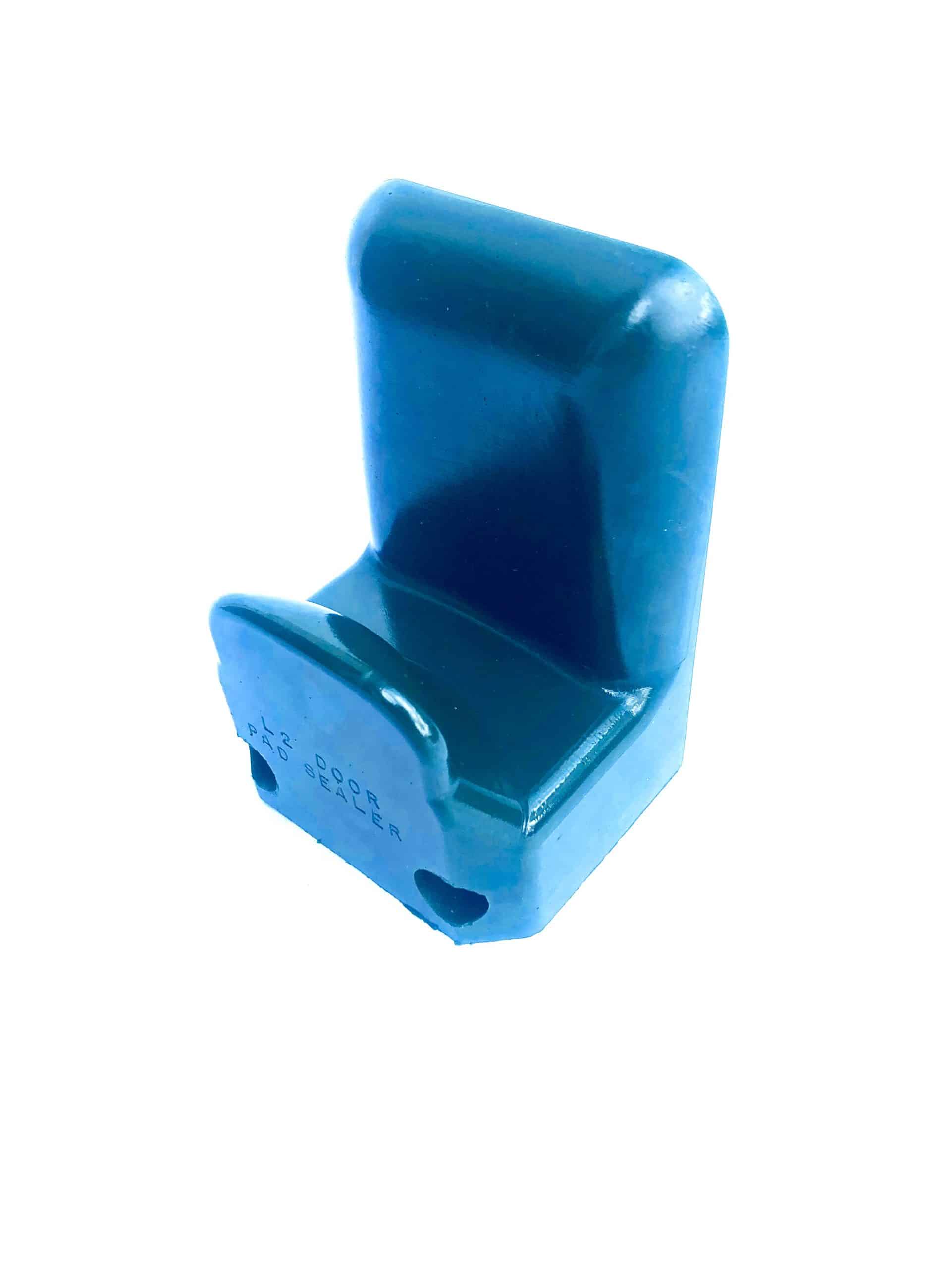 Blue polyurethane body block designed to hold a specific door during assembly operations.