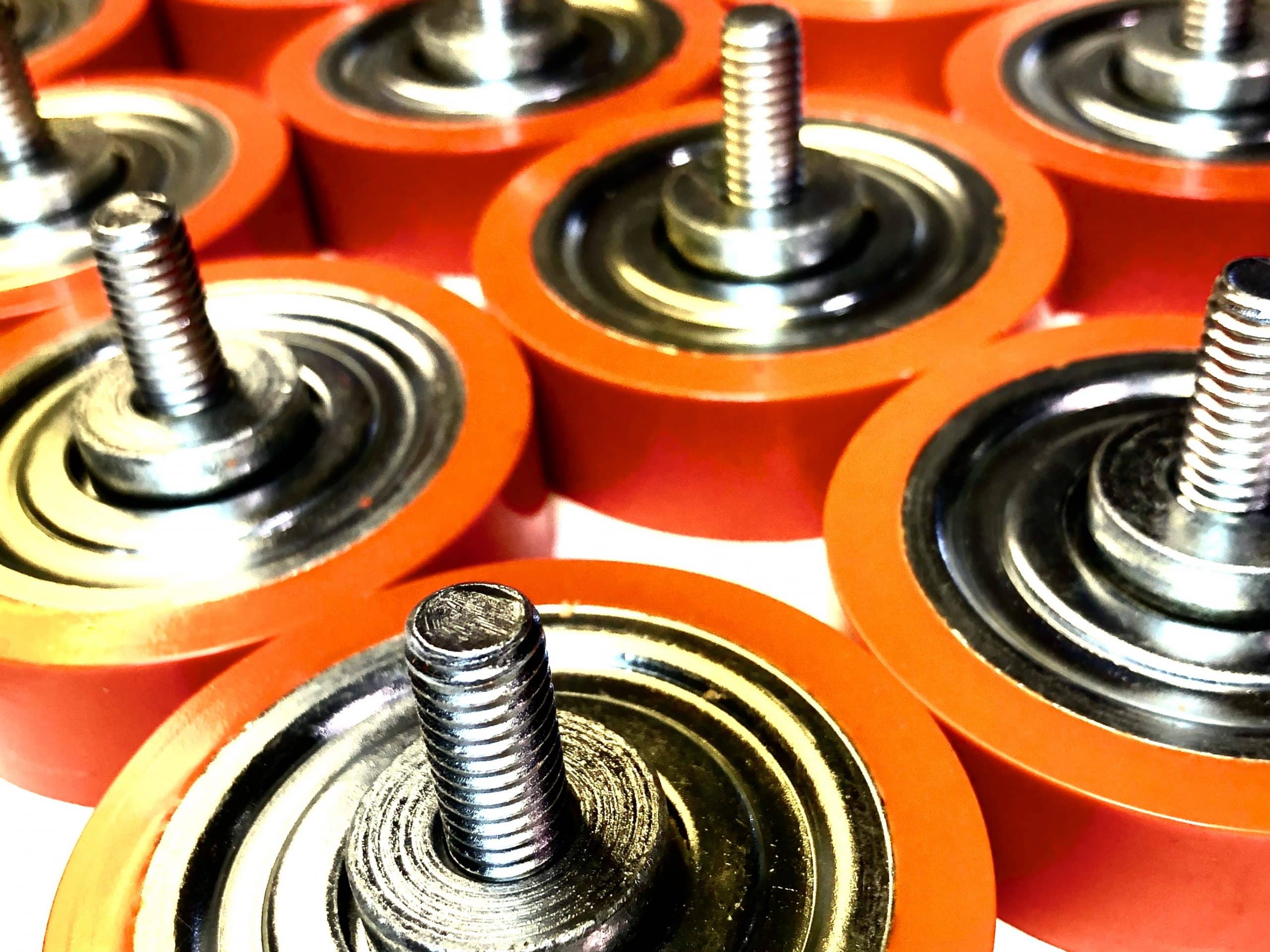 Male thread polyurethane rollers with ball bearing insert.