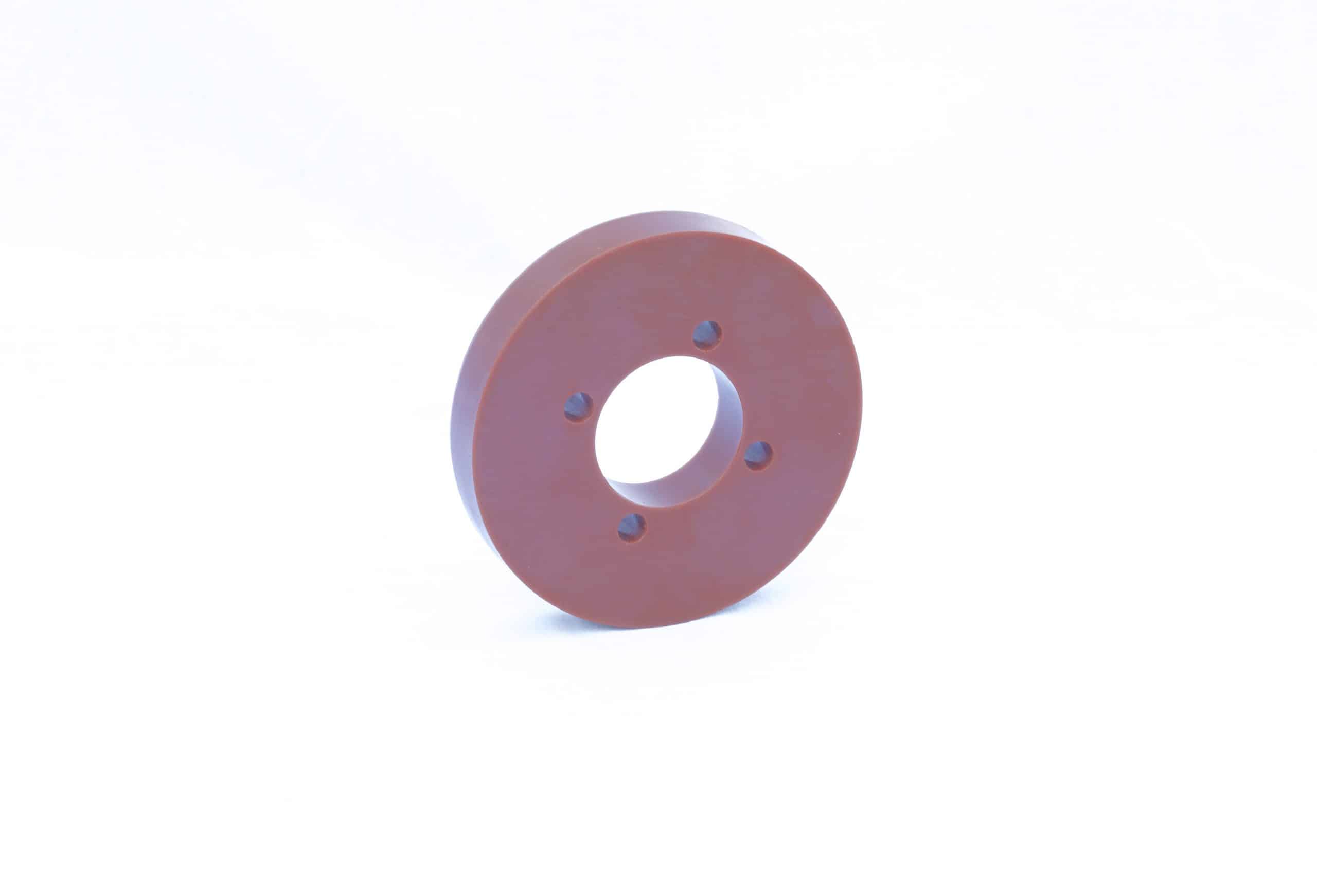 Brown polyurethane roller with no metal insert. 