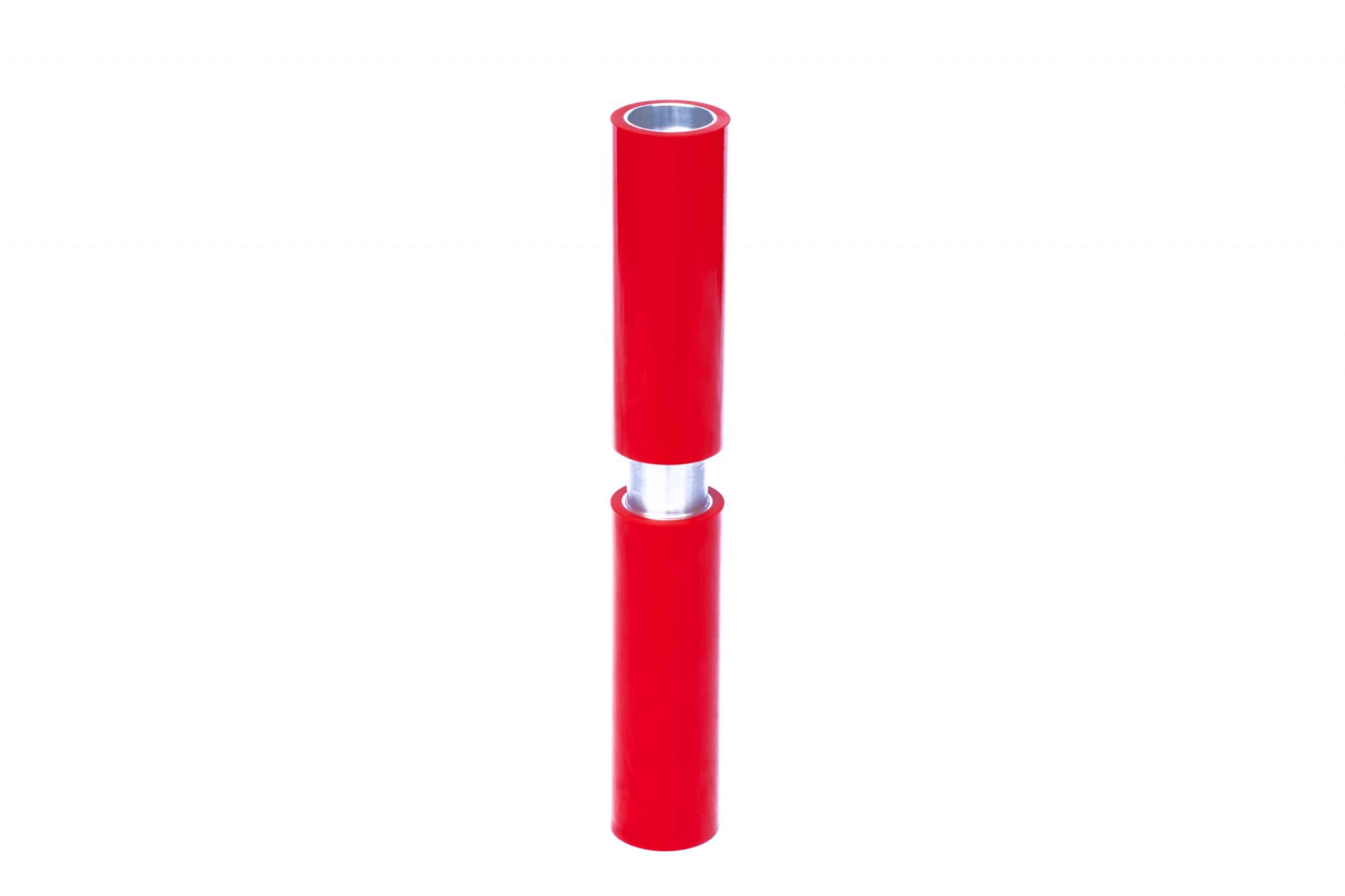 Small, red colored dual coat polyurethane roller with metal insert. 