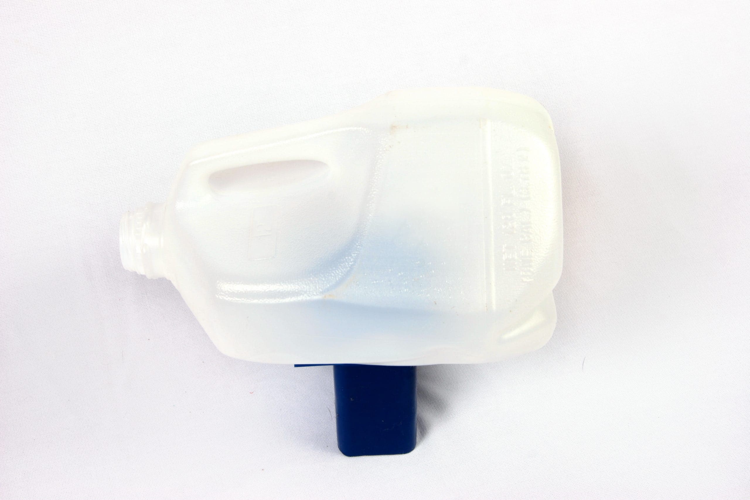 One gallon pollyurethane V-bucket for carrying one gallon jugs in blow molding operations.