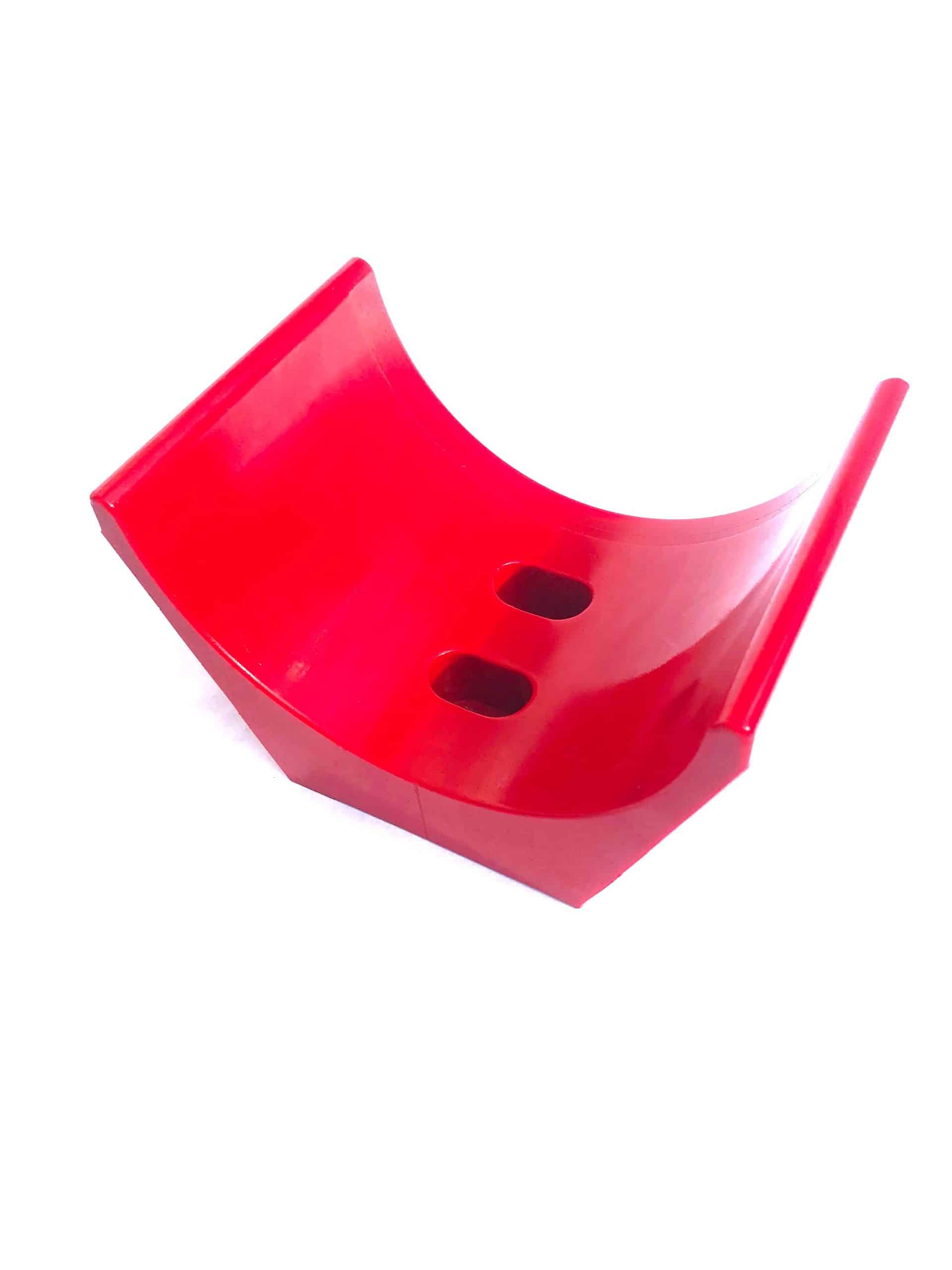 Large, horseshoe shaped polyurethane transport fixture for blow molding operations.