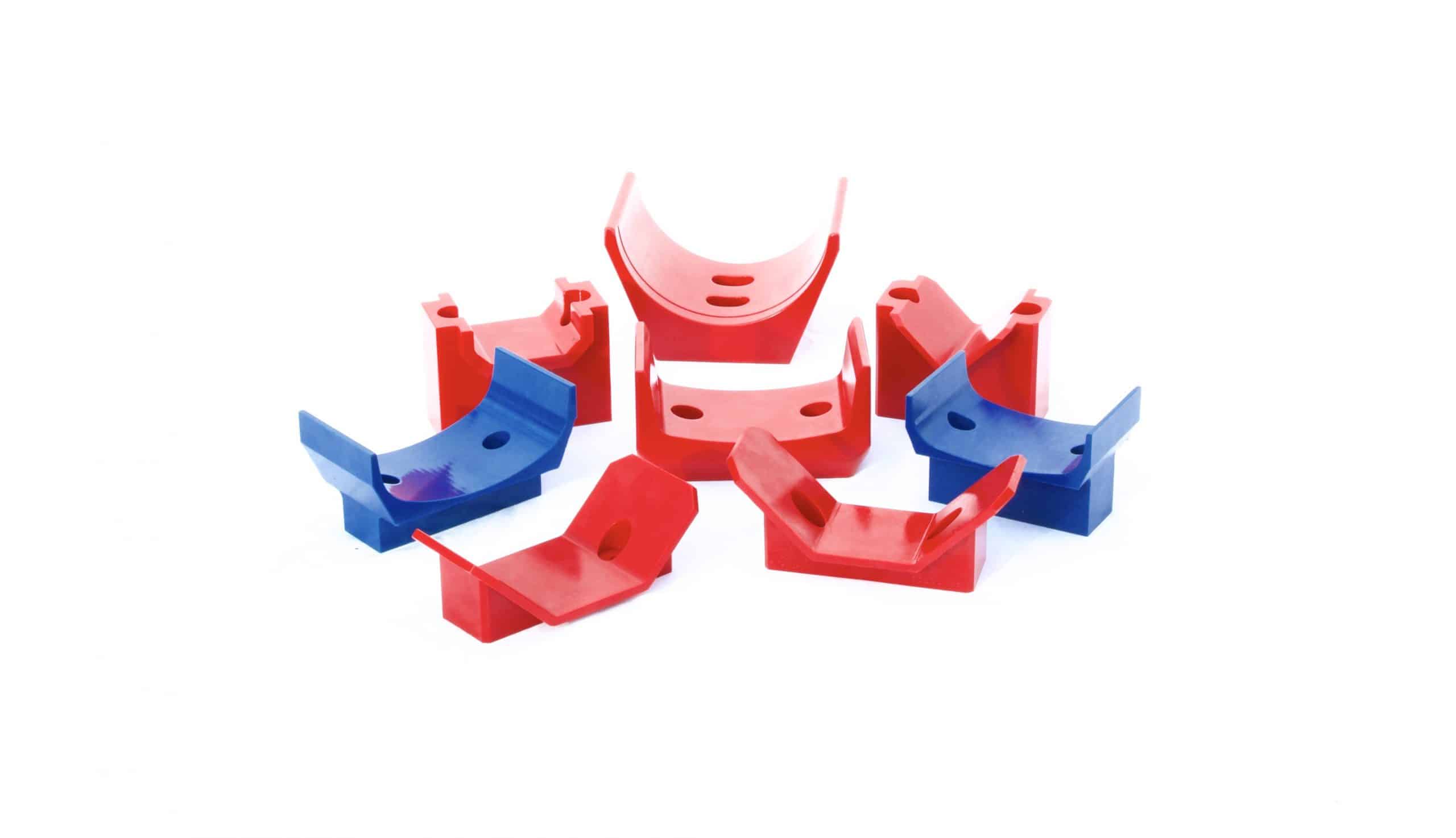 Array of red and blue polyurethane transport fixtures.