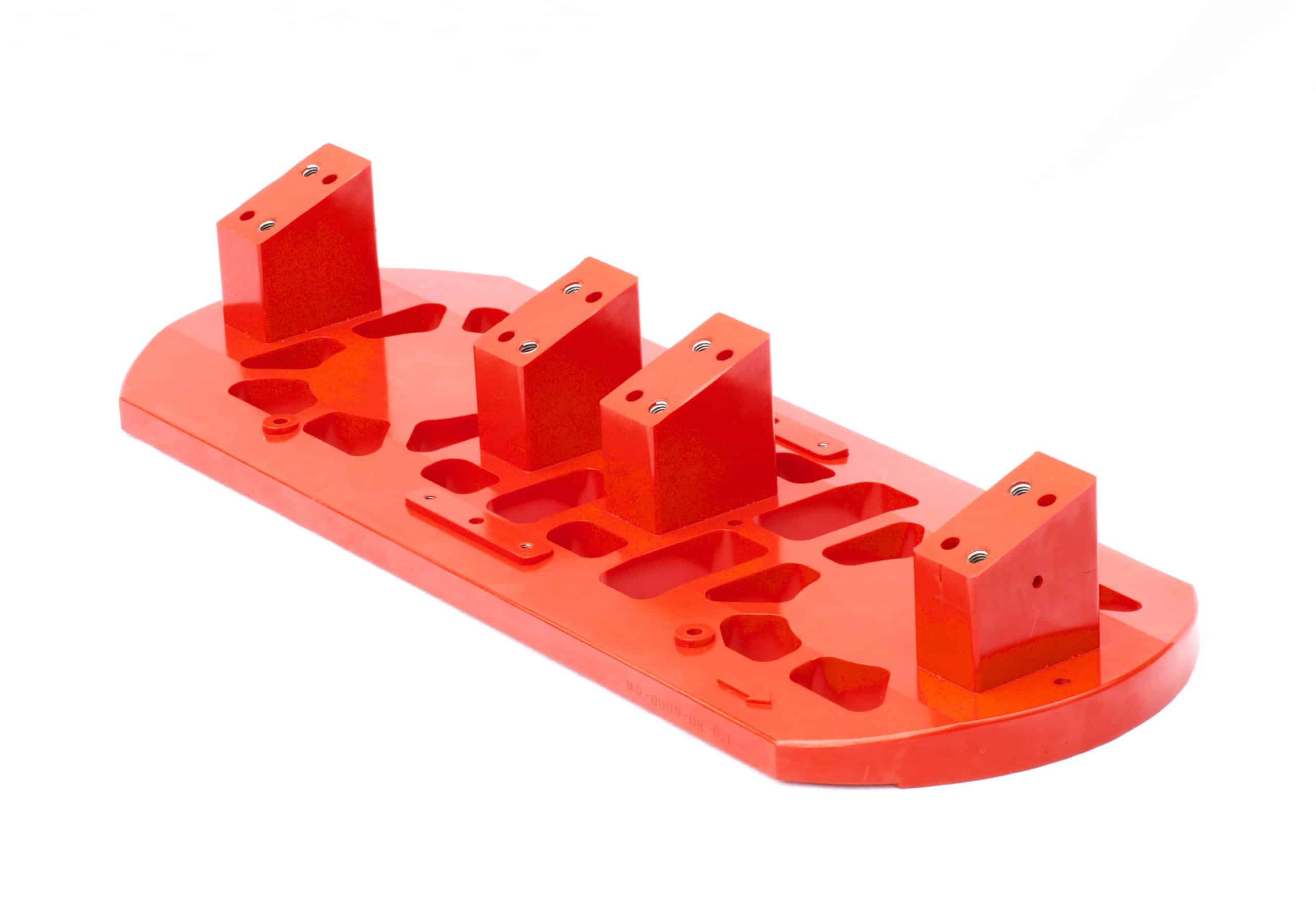 Large polyurethane pallet for stransporting frames through assembly operations.